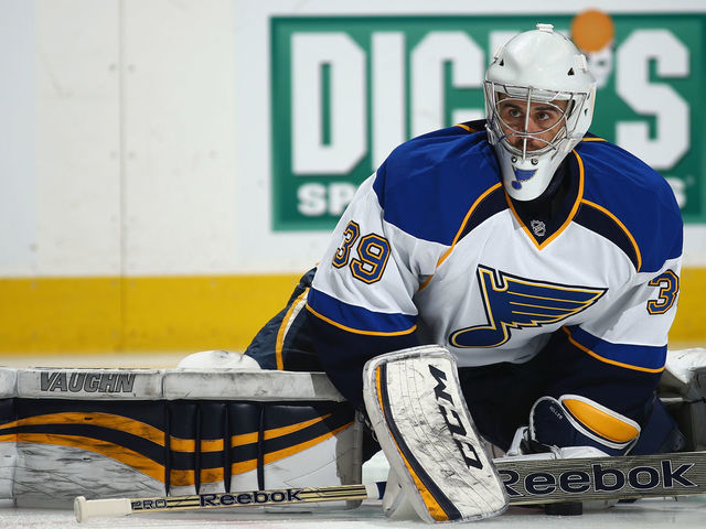 DENVER, CO - MARCH 08: Goalie Ryan Miller #39 of the St. Louis Blues stretches during warm ups prior to facing the Colorado Avalanche at Pepsi Center on March 8, 2014 in Denver, Colorado.