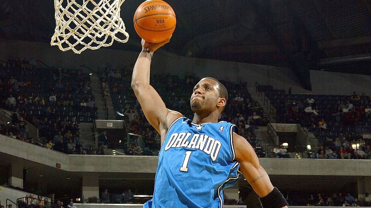 INDIANAPOLIS - DECEMBER 17: Tracy McGrady #1 of the Orlando Magic dunks the ball against the Indiana Pacers on December17, 2003 at Conseco Fieldhouse in Indianapolis, Indiana. The Magic won 94-90.