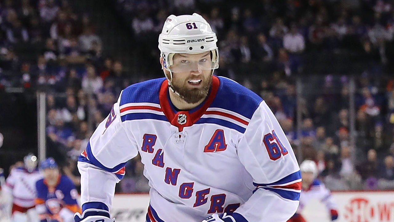 NEW YORK, NY - FEBRUARY 15: Rick Nash #61 of the New York Rangers chases the puck in the third period against the New York Islanders during their game at Barclays Center on February 15, 2018 in the Brooklyn borough of New York City.