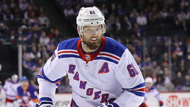 NEW YORK, NY - FEBRUARY 15: Rick Nash #61 of the New York Rangers chases the puck in the third period against the New York Islanders during their game at Barclays Center on February 15, 2018 in the Brooklyn borough of New York City.