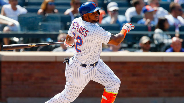 NEW YORK, NY - AUGUST 24: Yoenis Cespedes #52 of the New York Mets follows through on a sixth inning double against the Arizona Diamondbacks at Citi Field on August 24, 2017 in the Flushing neighborhood of the Queens borough of New York City.