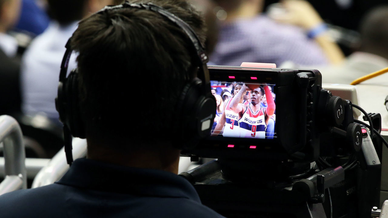 04 October, 2016: A camera man watches Washington Wizards guard Sheldon McClellan (9) take a foul shot during a preseason NBA game between the Washington Wizards and the Miami Heat at the Verizon Center in Washington D.C.