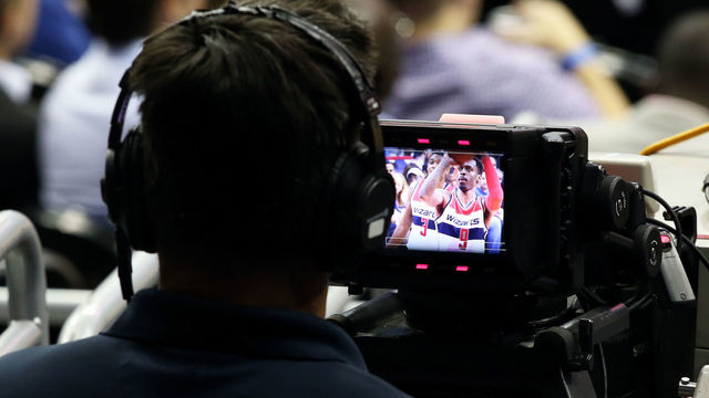 04 October, 2016: A camera man watches Washington Wizards guard Sheldon McClellan (9) take a foul shot during a preseason NBA game between the Washington Wizards and the Miami Heat at the Verizon Center in Washington D.C.