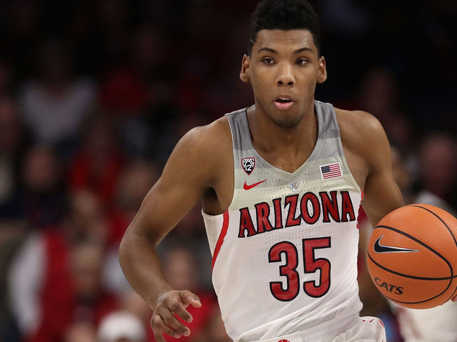 TUCSON, AZ - DECEMBER 21: Allonzo Trier #35 of the Arizona Wildcats handles the ball during the first half of the college basketball game against the Connecticut Huskies at McKale Center on December 21, 2017 in Tucson, Arizona. The Wildcats defeated the Huskies 73-58.
