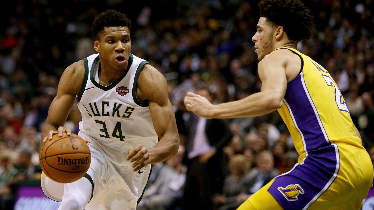 MILWAUKEE, WI - NOVEMBER 11: Giannis Antetokounmpo #34 of the Milwaukee Bucks dribbles the ball while being guarded by Lonzo Ball #2 of the Los Angeles Lakers in the second quarter at the Bradley Center on November 11, 2017 in Milwaukee, Wisconsin.
