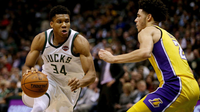 MILWAUKEE, WI - NOVEMBER 11: Giannis Antetokounmpo #34 of the Milwaukee Bucks dribbles the ball while being guarded by Lonzo Ball #2 of the Los Angeles Lakers in the second quarter at the Bradley Center on November 11, 2017 in Milwaukee, Wisconsin.