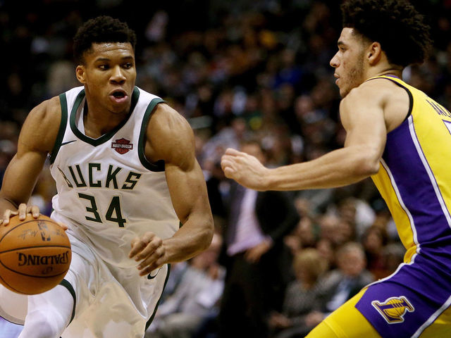 MILWAUKEE, WI - NOVEMBER 11: Giannis Antetokounmpo #34 of the Milwaukee Bucks dribbles the ball while being guarded by Lonzo Ball #2 of the Los Angeles Lakers in the second quarter at the Bradley Center on November 11, 2017 in Milwaukee, Wisconsin.