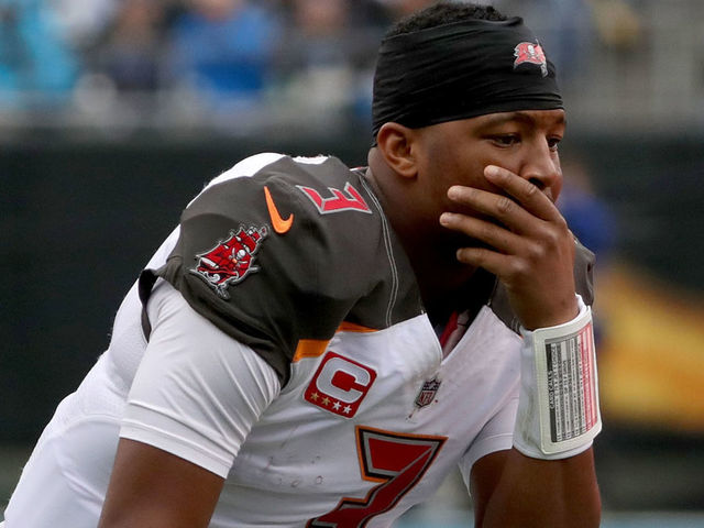 CHARLOTTE, NC - DECEMBER 24: Jameis Winston #3 of the Tampa Bay Buccaneers reacts between plays against the Carolina Panthers in the fourth quarter during their game at Bank of America Stadium on December 24, 2017 in Charlotte, North Carolina.