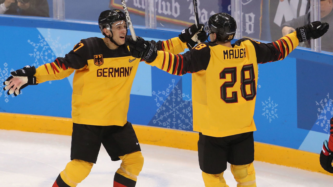 GANGNEUNG, SOUTH KOREA - FEBRUARY 23: Marcel Goc #57 and Frank Mauer #28 of Germany celebrate after a goal by Mauer in the second period during the Men's Play-offs Semifinals on day fourteen of the PyeongChang 2018 Winter Olympic Games at Gangneung Hockey Centre on February 23, 2018 in Gangneung, South Korea.