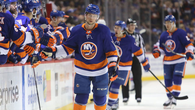 NEW YORK, NY - FEBRUARY 15: Josh Bailey #12 of the New York Islanders celebrates with teammates after scoring a goal in the first period against the New York Rangers during their game at Barclays Center on February 15, 2018 in the Brooklyn borough of New York City.