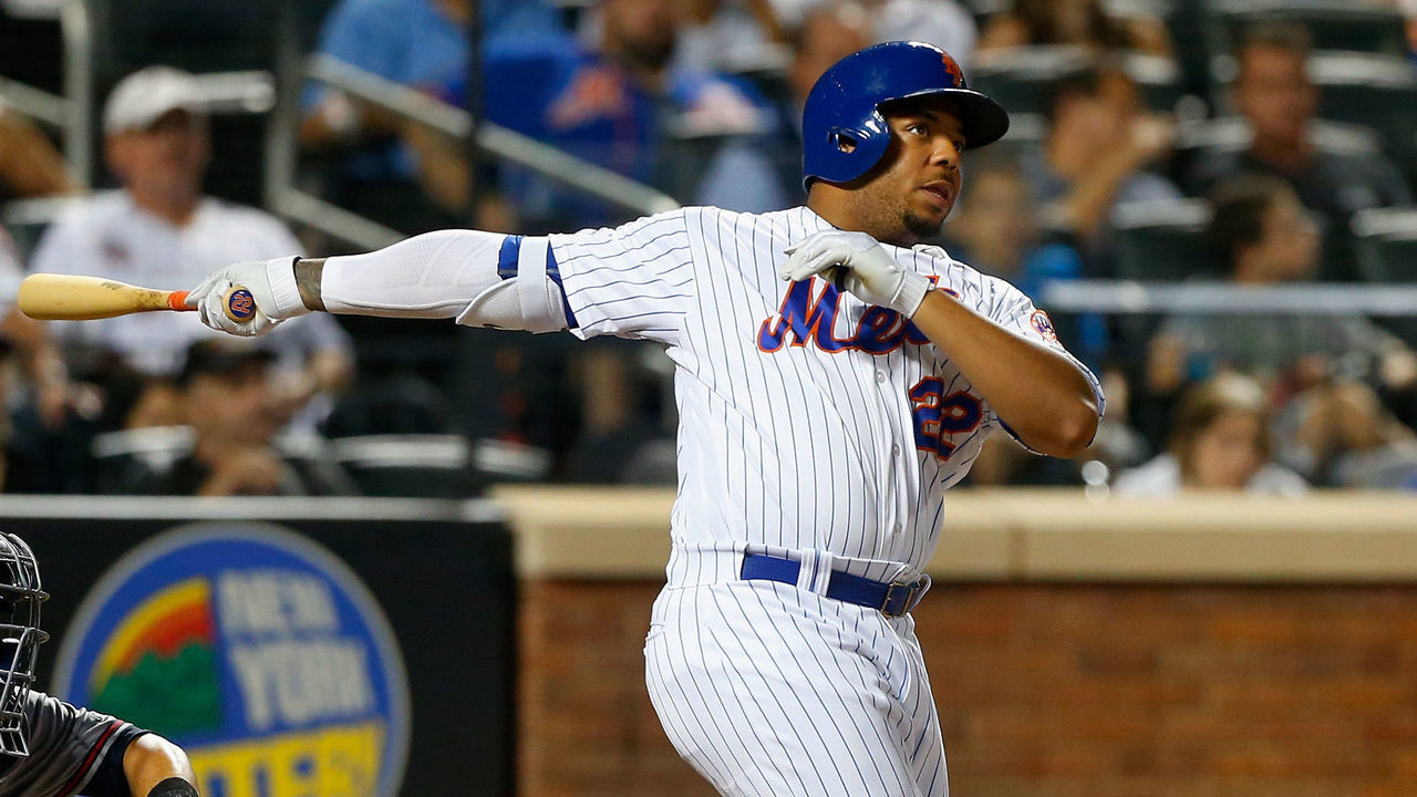 NEW YORK, NY - SEPTEMBER 27: Dominic Smith #22 of the New York Mets follows through on a seventh inning pinch hit three run home run against the Atlanta Braves at Citi Field on September 27, 2017 in the Flushing neighborhood of the Queens borough of New York City.