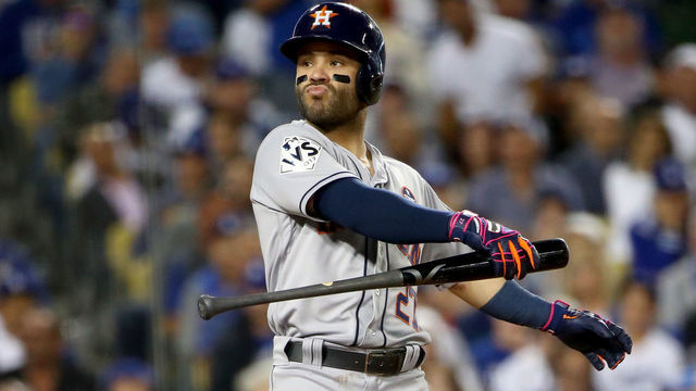 LOS ANGELES, CA - OCTOBER 31: Jose Altuve #27 of the Houston Astros reacts as he bats during the sixth inning against the Los Angeles Dodgers in game six of the 2017 World Series at Dodger Stadium on October 31, 2017 in Los Angeles, California.