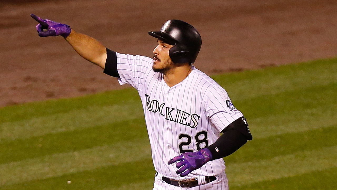 DENVER, CO - AUGUST 29: Nolan Arenado #28 of the Colorado Rockies celebrates his three run home run during the seventh inning of an interleague game against the Detroit Tigers at Coors Field on August 29, 2017 in Denver, Colorado.