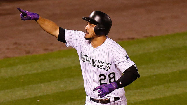 DENVER, CO - AUGUST 29: Nolan Arenado #28 of the Colorado Rockies celebrates his three run home run during the seventh inning of an interleague game against the Detroit Tigers at Coors Field on August 29, 2017 in Denver, Colorado.