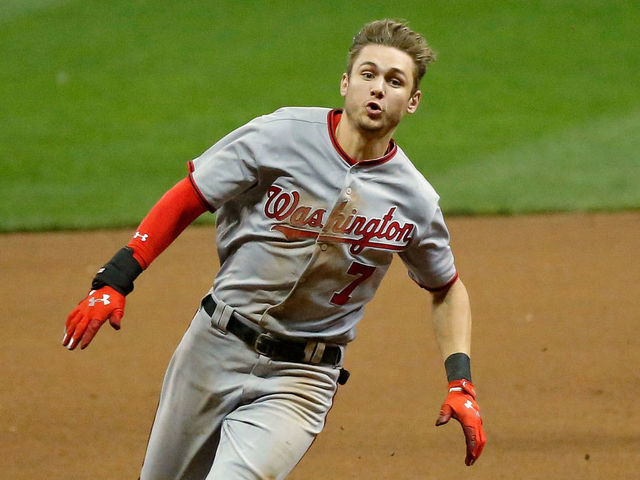 MILWAUKEE, WI - AUGUST 31: The helmet of Trea Turner #7 of the Washington Nationals falls off as he runs to third base on a triple against the Milwaukee Brewers during the eighth inning at Miller Park on August 31, 2017 in Milwaukee, Wisconsin.