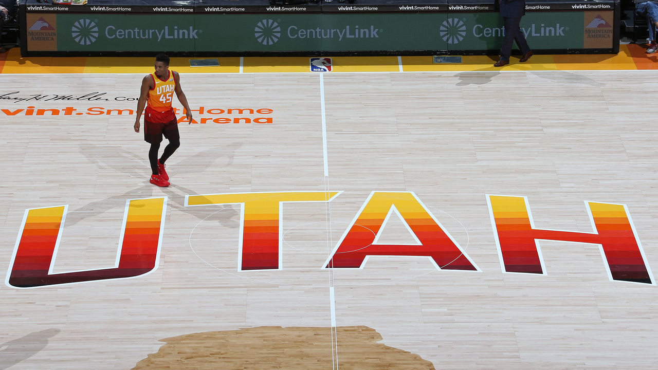 SALT LAKE CITY, UT - FEBRUARY 9: An overhead view of Donovan Mitchell #45 of the Utah Jazz standing at center court during the game against the Charlotte Hornets on February 9, 2018 at Vivint Smart Home Arena in Salt Lake City, Utah. Mandatory Copyright Notice: Copyright 2018 NBAE