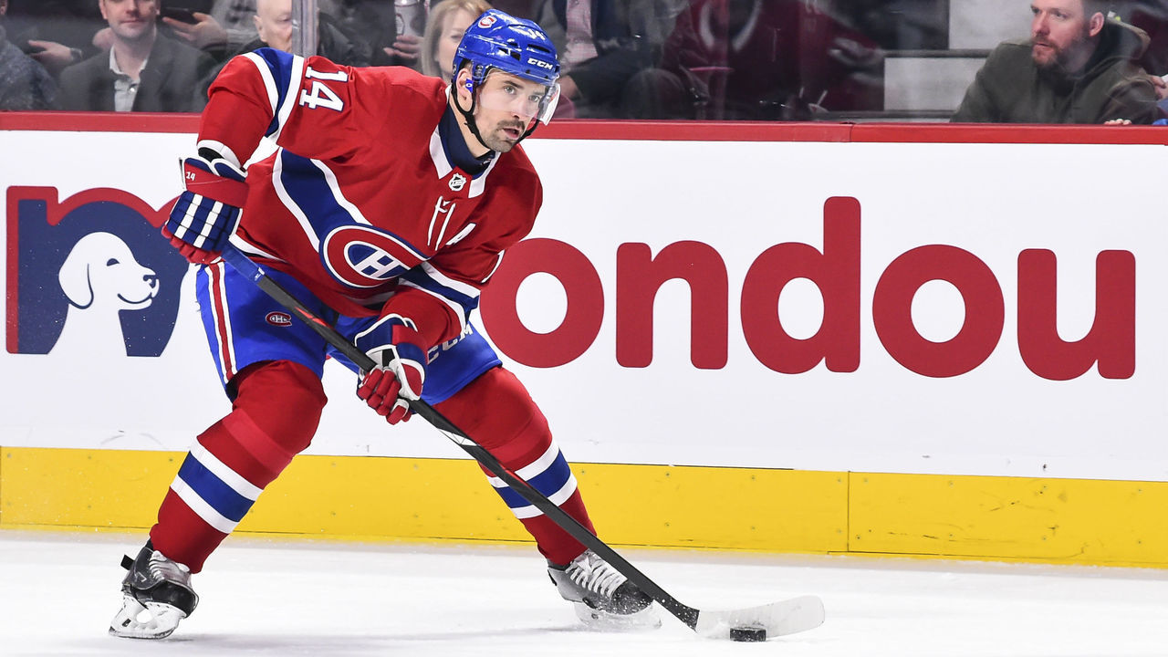 MONTREAL, QC - JANUARY 07: Tomas Plekanec #14 of the Montreal Canadiens skates the puck against the Vancouver Canucks during the NHL game at the Bell Centre on January 7, 2018 in Montreal, Quebec, Canada. The Montreal Canadiens defeated the Vancouver Canucks 5-2.