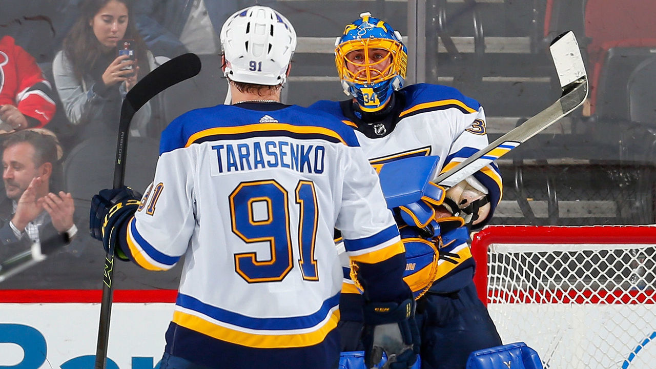 NEWARK, NJ - NOVEMBER 07: Jake Allen #34 and Vladimir Tarasenko #91 of the St. Louis Blues celebrate after defeating the New Jersey Devils on November 7, 2017 at Prudential Center in Newark, New Jersey.