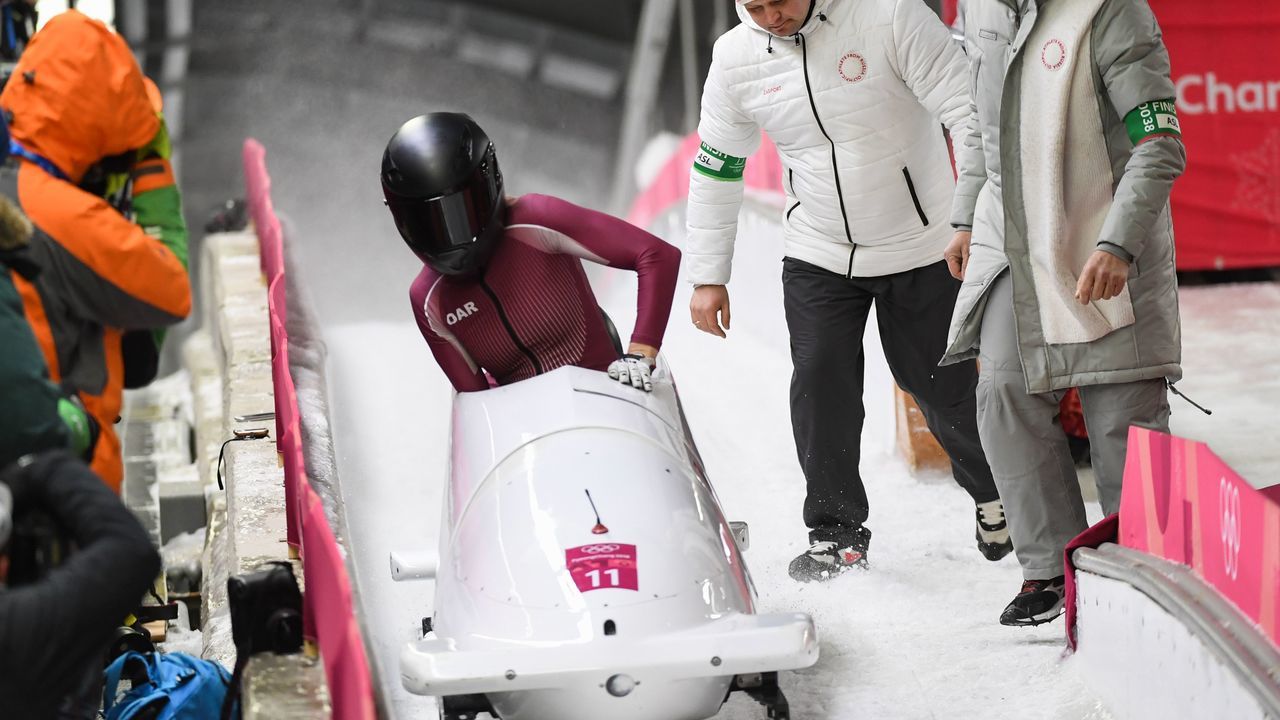 Russia's Nadezhda Sergeeva and Russia's Anastasia Kocherzhova compete in the women's bobsleigh heat 4 final run during the Pyeongchang 2018 Winter Olympic Games at the Olympic Sliding Centre on February 21, 2018 in Pyeongchang. / AFP PHOTO / Mark RALSTON