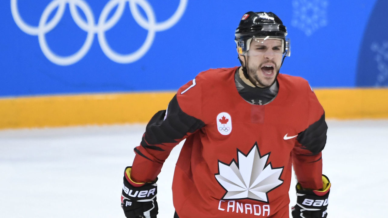 Canada's Gilbert Brule celebrates scoring a goal in the men's semi-final ice hockey match between Canada and Germany during the Pyeongchang 2018 Winter Olympic Games at the Gangneung Hockey Centre in Gangneung on February 23, 2018. / AFP PHOTO / JUNG Yeon-Je