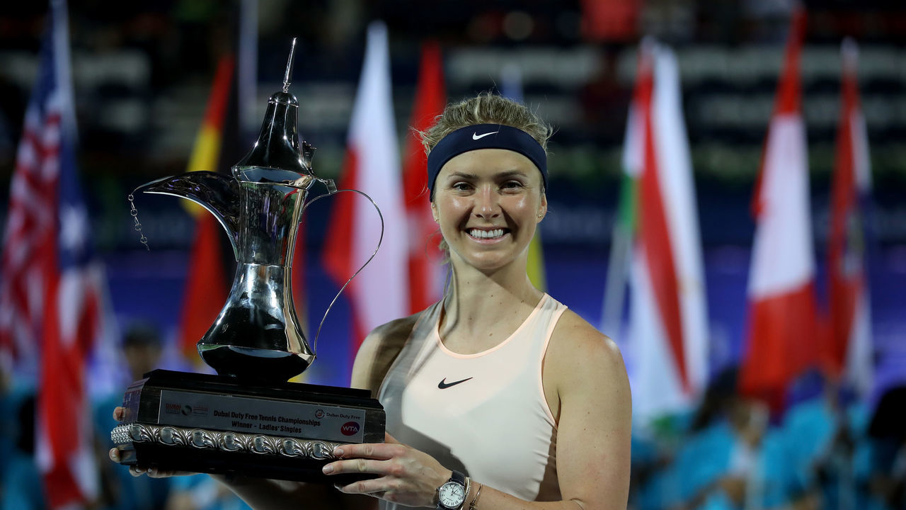 DUBAI, UNITED ARAB EMIRATES - FEBRUARY 24: Elina Svitolina of Ukraine poses with the trophy after winning the WTA Dubai Duty Free Tennis Championship at the Dubai Duty Free Stadium on February 24, 2018 in Dubai, United Arab Emirates.