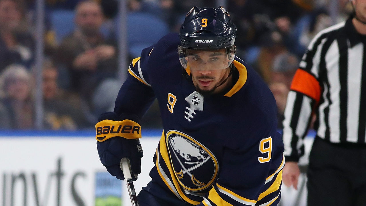 BUFFALO, NY - JANUARY 9: Evander Kane #9 of the Buffalo Sabres in play against the Winnipeg Jets at the KeyBank Center on January 9, 2018 in Buffalo, New York. The Jets beat the Sabres 7-4.