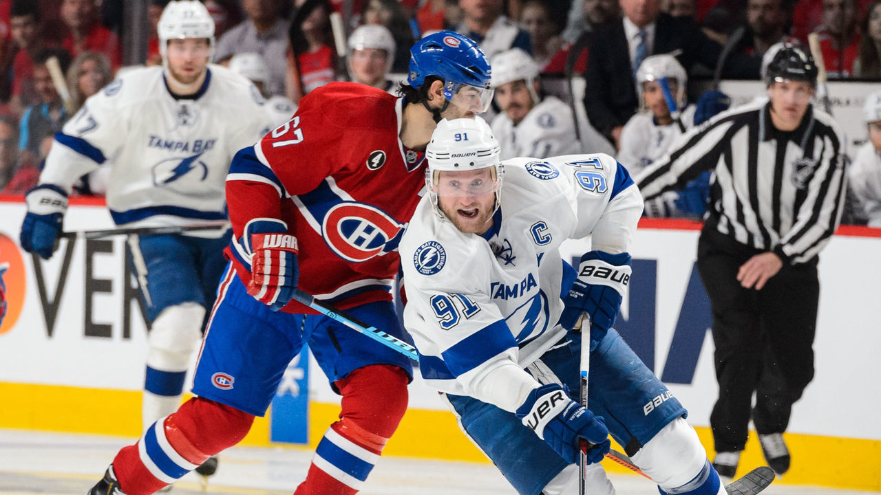 MONTREAL, QC - MAY 09: Steven Stamkos #91 of the Tampa Bay Lightning moves the puck in Game Five of the Eastern Conference Semifinals against the Montreal Canadiens during the 2015 NHL Stanley Cup Playoffs at the Bell Centre on May 9, 2015 in Montreal, Quebec, Canada. The Canadiens defeated the Lightning 2-1. The Lightning lead the series 3-2.