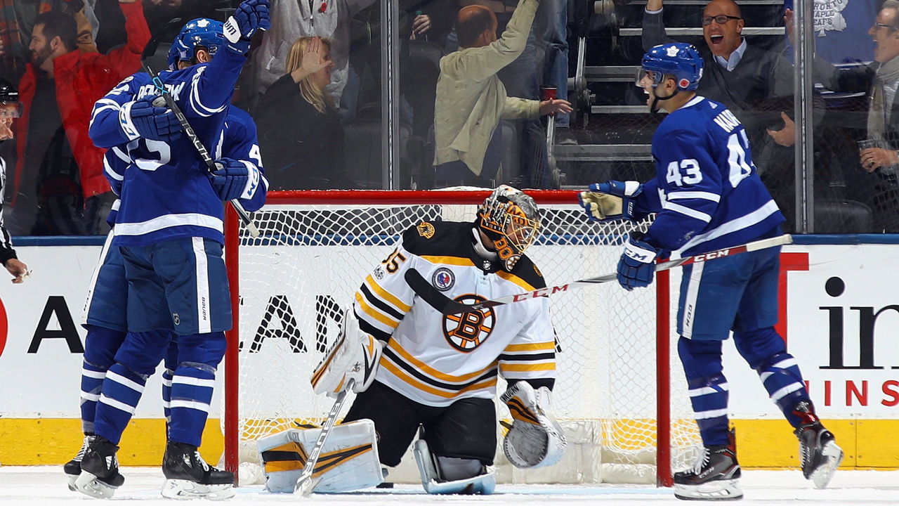 TORONTO, ON - NOVEMBER 10: The Toronto Maple Leafs celebrate a game tying goal by James van Riemsdyk #25 (l) against Anton Khudobin #35 of the Boston Bruins at 19:00 of the third period at the Air Canada Centre on November 10, 2017 in Toronto, Canada. The Leafs defeated the Bruins 3-2 in overtime.
