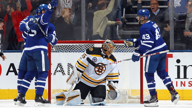 TORONTO, ON - NOVEMBER 10: The Toronto Maple Leafs celebrate a game tying goal by James van Riemsdyk #25 (l) against Anton Khudobin #35 of the Boston Bruins at 19:00 of the third period at the Air Canada Centre on November 10, 2017 in Toronto, Canada. The Leafs defeated the Bruins 3-2 in overtime.
