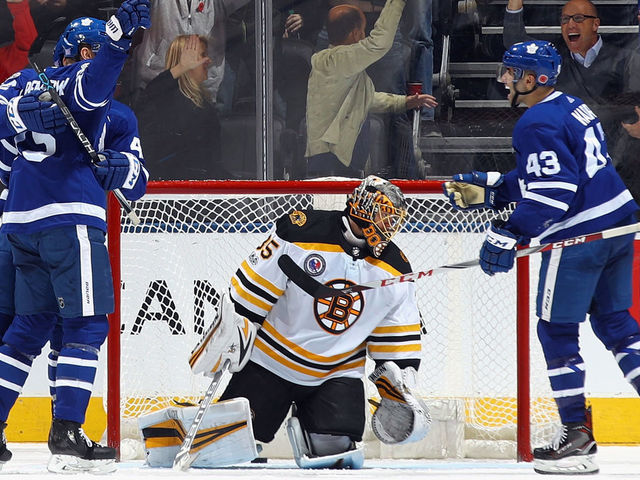 TORONTO, ON - NOVEMBER 10: The Toronto Maple Leafs celebrate a game tying goal by James van Riemsdyk #25 (l) against Anton Khudobin #35 of the Boston Bruins at 19:00 of the third period at the Air Canada Centre on November 10, 2017 in Toronto, Canada. The Leafs defeated the Bruins 3-2 in overtime.