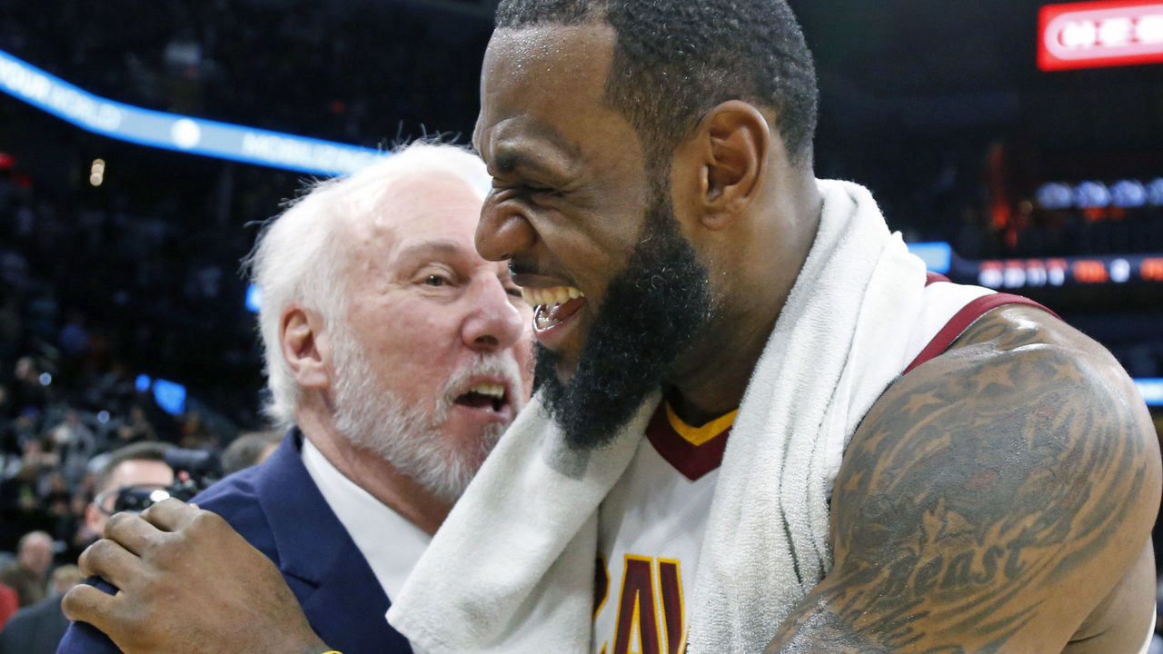 SAN ANTONIO,TX - JANUARY 23 : LeBron James #23 of the Cleveland Cavaliers is congratulated by Gregg Popovich head coach of the San Antonio Spurs at the end of the game at AT&T Center on January 23, 2018 in San Antonio, Texas. NOTE TO USER: User expressly acknowledges and agrees that , by downloading and or using this photograph, User is consenting to the terms and conditions of the Getty Images License Agreement.