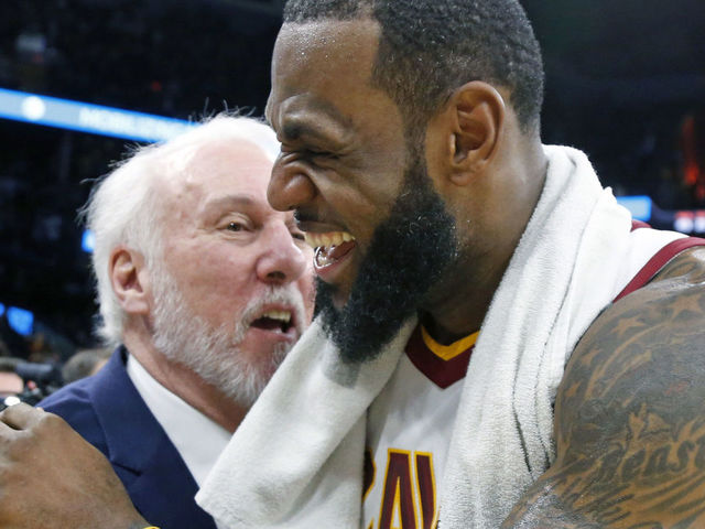 SAN ANTONIO,TX - JANUARY 23 : LeBron James #23 of the Cleveland Cavaliers is congratulated by Gregg Popovich head coach of the San Antonio Spurs at the end of the game at AT&T Center on January 23, 2018 in San Antonio, Texas. NOTE TO USER: User expressly acknowledges and agrees that , by downloading and or using this photograph, User is consenting to the terms and conditions of the Getty Images License Agreement.