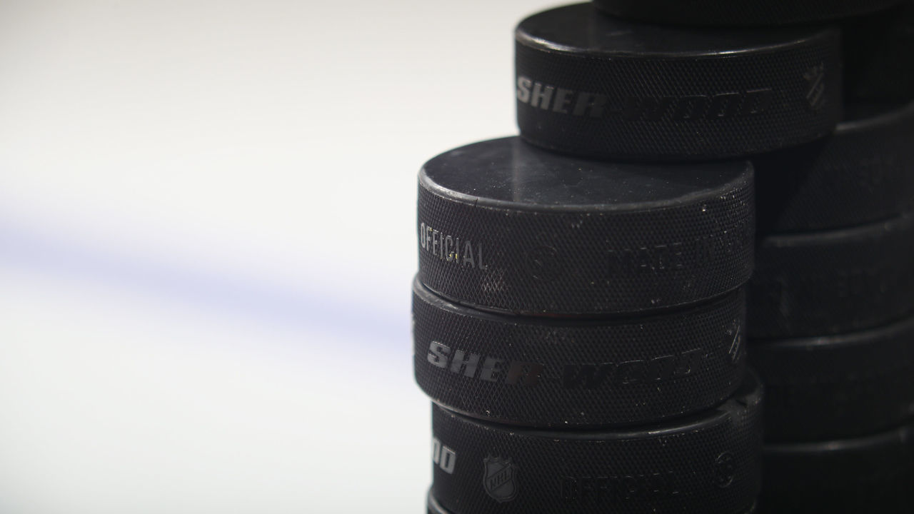 PHILADELPHIA, PA - JANUARY 04: Pucks sit on the bench prior to warmups leading to the game between the Philadelphia Flyers and the New York Rangers at the Wells Fargo Center on January 4, 2017 in Philadelphia, Pennsylvania. The Rangers defeated the Flyers 5-2.
