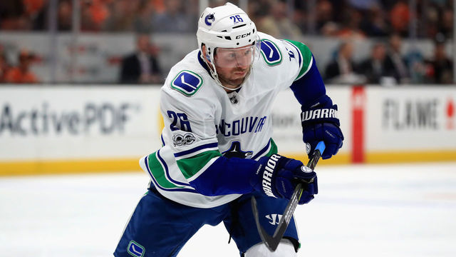 ANAHEIM, CA - NOVEMBER 09: Thomas Vanek #26 of the Vancouver Canucks skates to a loose puck during the second period of a game against the Anaheim Ducks at Honda Center on November 9, 2017 in Anaheim, California.