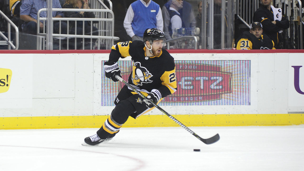 PITTSBURGH, PA - OCTOBER 07: Ian Cole #28 of the Pittsburgh Penguins skates with the puck against the Nashville Predators at PPG PAINTS Arena on October 7, 2017 in Pittsburgh, Pennsylvania.