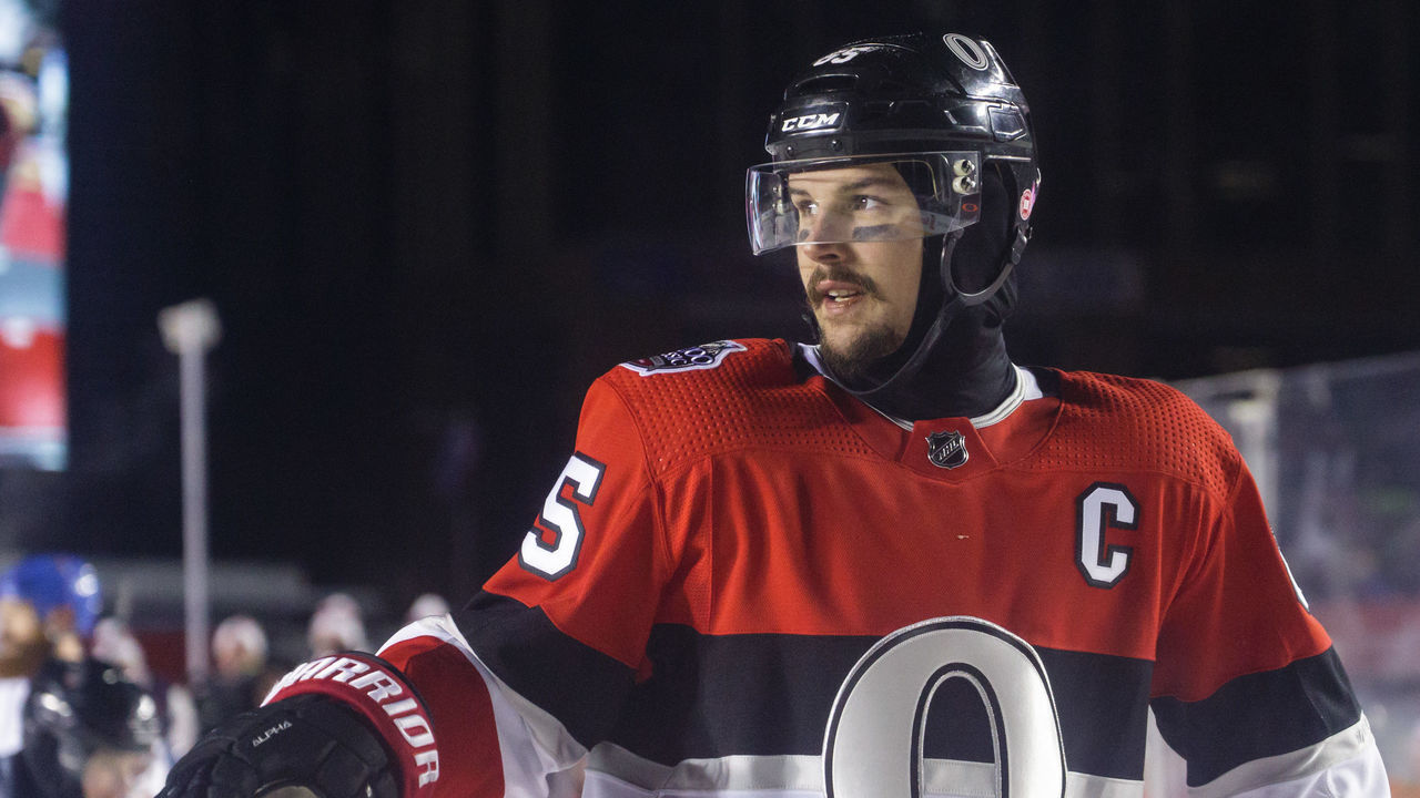OTTAWA, ON - DECEMBER 16: Erik Karlsson #65 of the Ottawa Senators looks on during a game against the Montreal Canadiens during the of the 2017 Scotiabank NHL100 Classic at Lansdowne Park on December 16, 2017 in Ottawa, Canada.