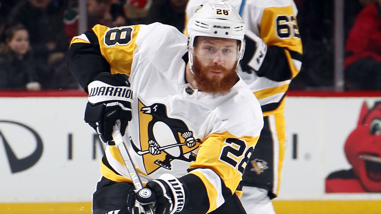 NEWARK, NJ - FEBRUARY 3: Ian Cole #28 of the Pittsburgh Penguins shoots during an NHL hockey game against the New Jersey Devils at Prudential Center on February 3, 2018 in Newark, New Jersey.