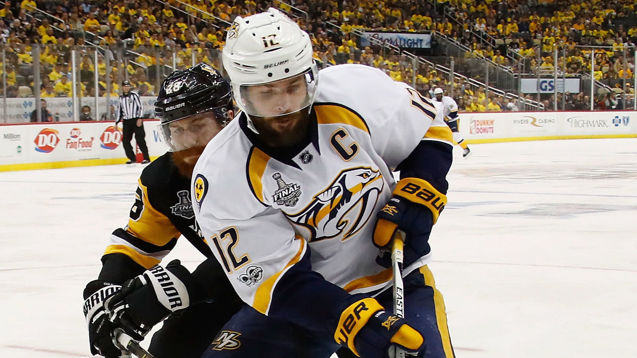 PITTSBURGH, PA - MAY 31: Mike Fisher #12 of the Nashville Predators skates against Ian Cole #28 of the Pittsburgh Penguins during the second period in Game Two of the 2017 NHL Stanley Cup Final at PPG Paints Arena on May 31, 2017 in Pittsburgh, Pennsylvania.