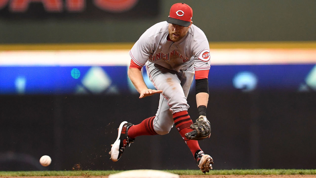 MILWAUKEE, WI - SEPTEMBER 26: Zack Cozart #2 of the Cincinnati Reds fields a ground ball during the seventh inning of a game against the Milwaukee Brewers at Miller Park on September 26, 2017 in Milwaukee, Wisconsin.