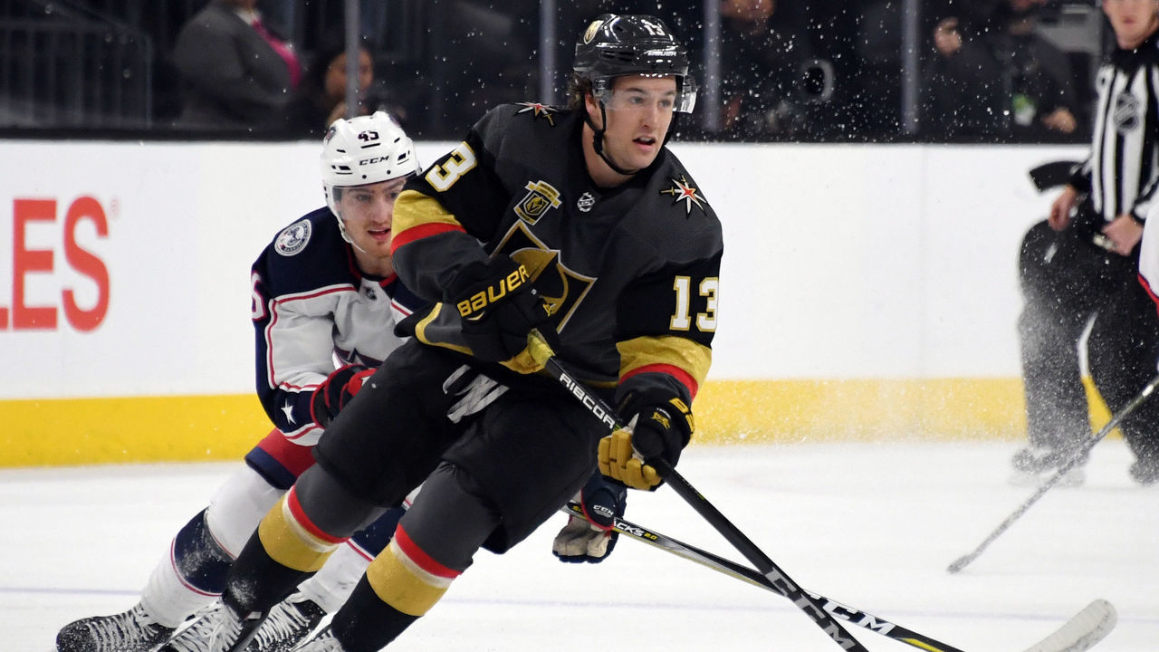 LAS VEGAS, NV - JANUARY 23: Brendan Leipsic #13 of the Vegas Golden Knights skates with the puck against Lukas Sedlak #45 of the Columbus Blue Jackets in the first period of their game at T-Mobile Arena on January 23, 2018 in Las Vegas, Nevada. The Golden Knights won 6-3.