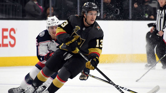 LAS VEGAS, NV - JANUARY 23: Brendan Leipsic #13 of the Vegas Golden Knights skates with the puck against Lukas Sedlak #45 of the Columbus Blue Jackets in the first period of their game at T-Mobile Arena on January 23, 2018 in Las Vegas, Nevada. The Golden Knights won 6-3.