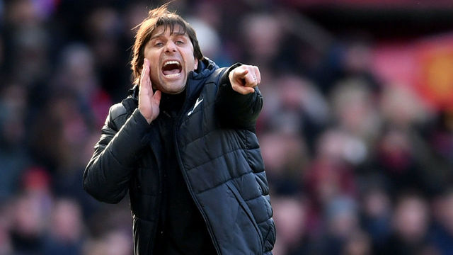 MANCHESTER, ENGLAND - FEBRUARY 25: Antonio Conte, Manager of Chelsea gives his team instructions during the Premier League match between Manchester United and Chelsea at Old Trafford on February 25, 2018 in Manchester, England.