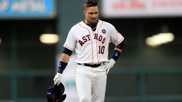 HOUSTON, TX - OCTOBER 21: Yuli Gurriel #10 of the Houston Astros reacts after Aaron Judge #99 of the New York Yankees caught a line drive in the outfield during the second inning in Game Seven of the American League Championship Series at Minute Maid Park on October 21, 2017 in Houston, Texas.