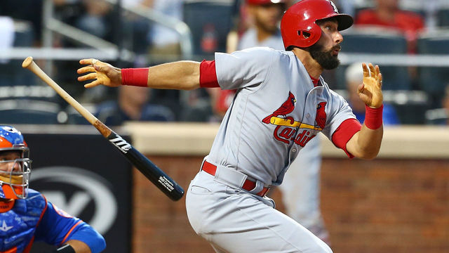 NEW YORK, NEW YORK - JULY 18: Matt Carpenter #13 of the St. Louis Cardinals singles to center in the fourth inning against the New York Mets at Citi Field on July 18, 2017 in the Flushing neighborhood of the Queens borough of New York City.