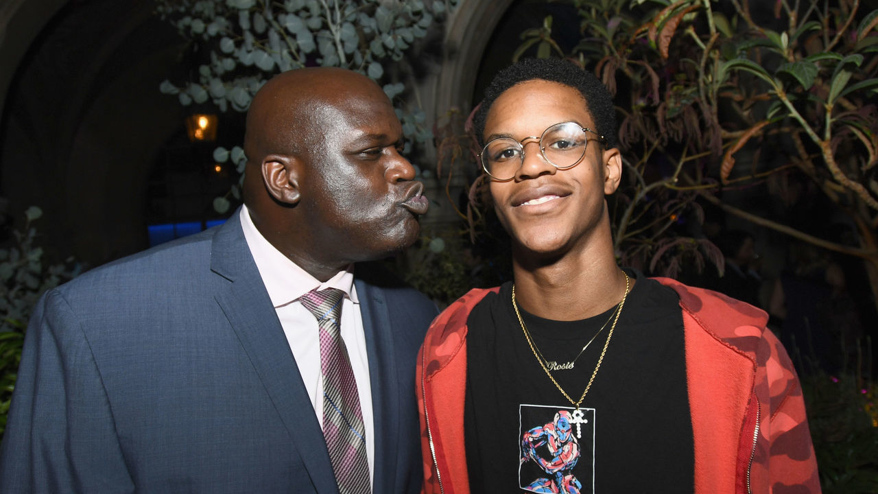 WEST HOLLYWOOD, CA - AUGUST 07: Former NBA player Shaquille O'Neal (L) and son Shareef O'Neal at Apple Music Launch Party Carpool Karaoke: The Series with James Corden on August 7, 2017 in West Hollywood, California.