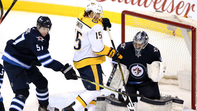 Predators score 3 straight in 3rd to top Jets in wild Central Division clash