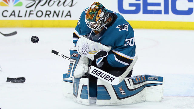 SAN JOSE, CA - DECEMBER 21: Aaron Dell #30 of the San Jose Sharks makes a save against the Vancouver Canucks at SAP Center on December 21, 2017 in San Jose, California.