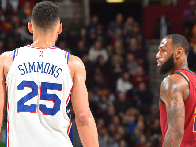 CLEVELAND, OH - DECEMBER 9: Ben Simmons #25 of the Philadelphia 76ers looks on LeBron James #23 of the Cleveland Cavaliers against December 9, 2017 at Quicken Loans Arena in Cleveland, Ohio. Mandatory Copyright Notice: Copyright 2017 NBAE