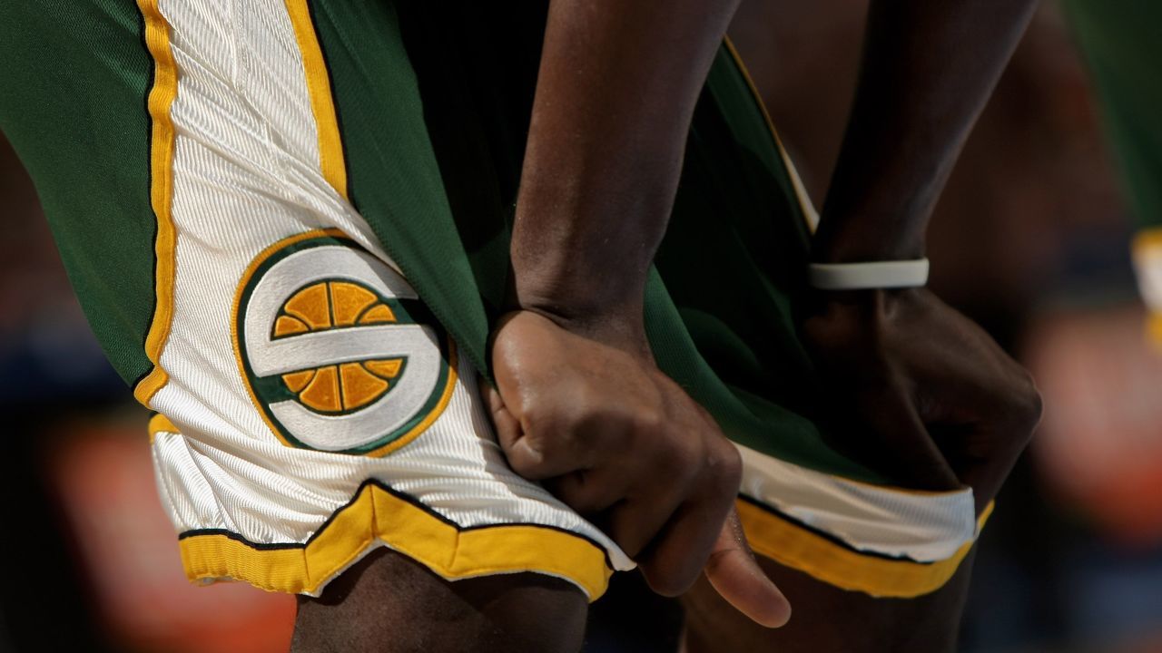 DENVER - MARCH 16: A member of the Seattle SuperSonics awaits action against the Denver Nuggets at the Pepsi Center on March 16, 2008 in Denver, Colorado. The Nuggets defeated the Sonics 168-116. NOTE TO USER: User expressly acknowledges and agrees that, by downloading and or using this photograph, user is consenting to the term and conditions of the Getty Images License Agreement.