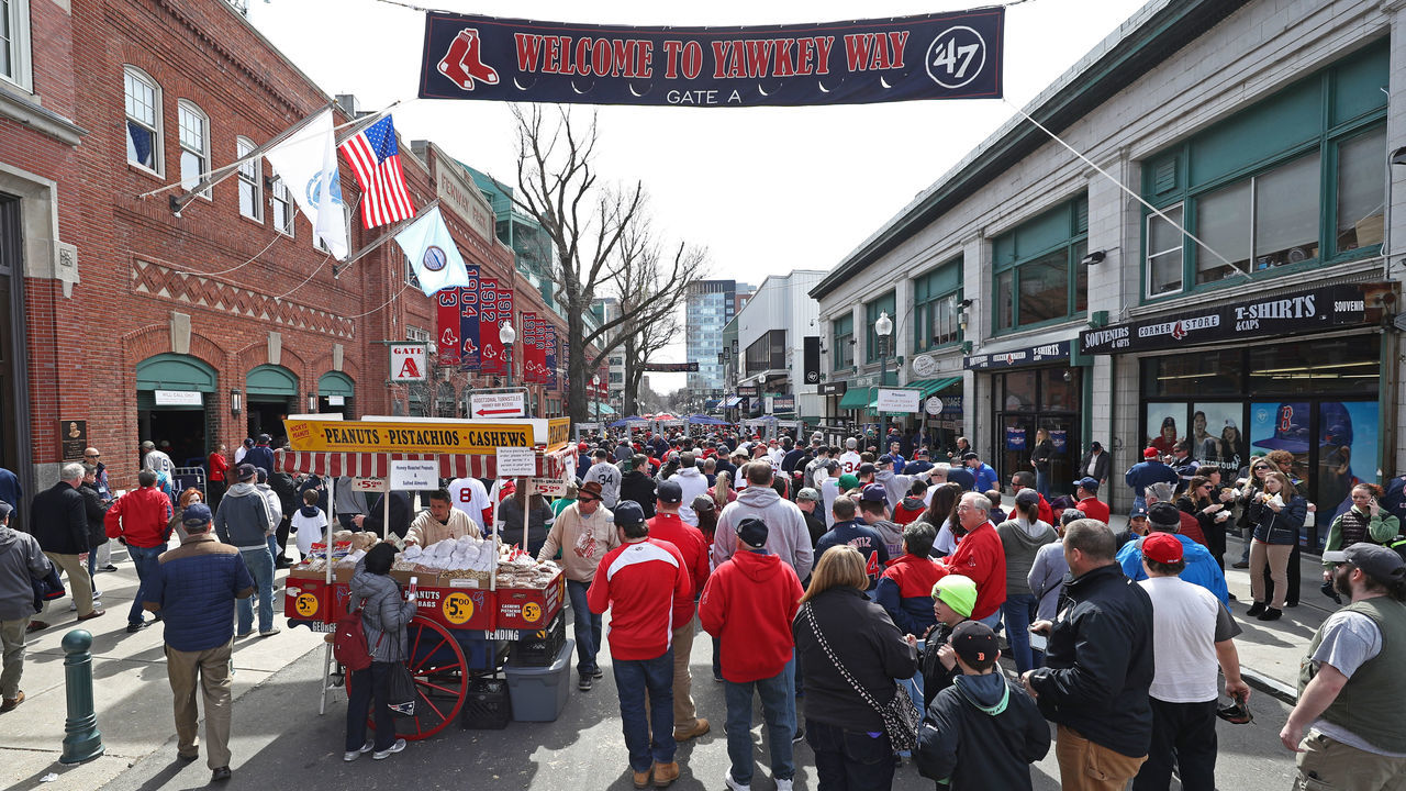 BOSTON, MA - APRIL 3: Fans walk down Yawkey Way before the opening day game between the Boston Red Sox and the Pittsburgh Pirates at Fenway Park on April 3, 2017 in Boston, Massachusetts.